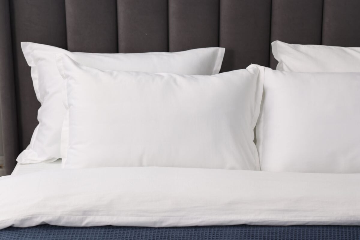 pillows shutterstock 2479566515 | The Hotel Room “Freebies” Travelers Often Mistakenly Take Home