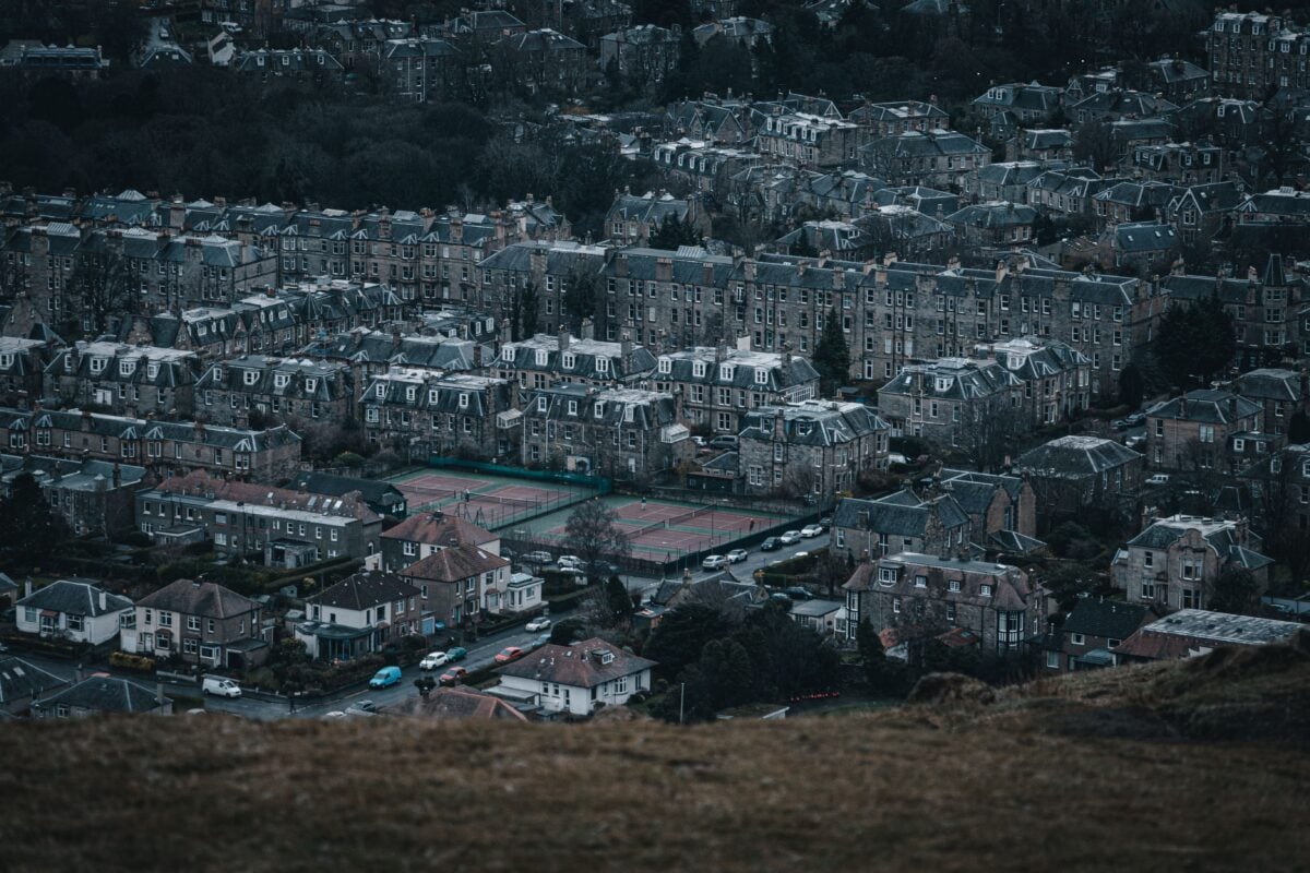 Aerial shot of a residential area in Edinburgh, Scotland with tennis courts and classic architecture.