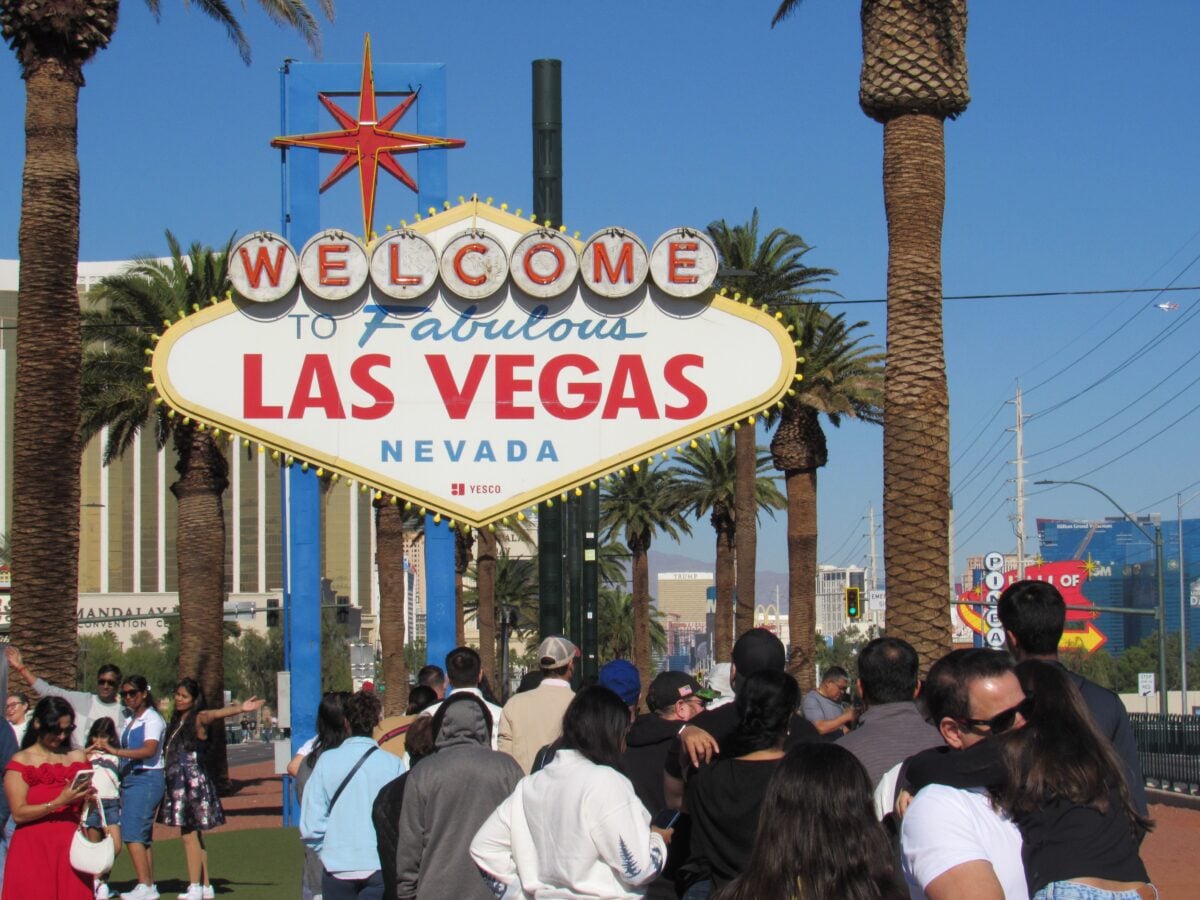 Visitors gather at the famous Welcome to Las Vegas sign, a must-see landmark in Nevada.
