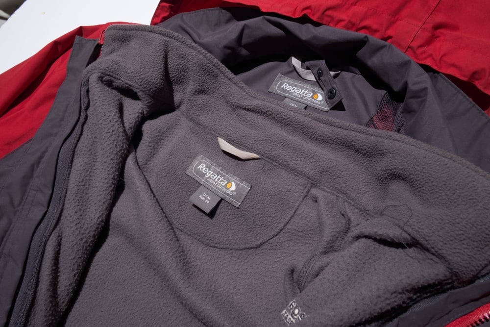 Kent, uk 01.01.2025 Regatta Great Outdoors Mens Outdoor red Hooded Waterproof Jacket medium. Winter snow and heavy rain proof jacket.