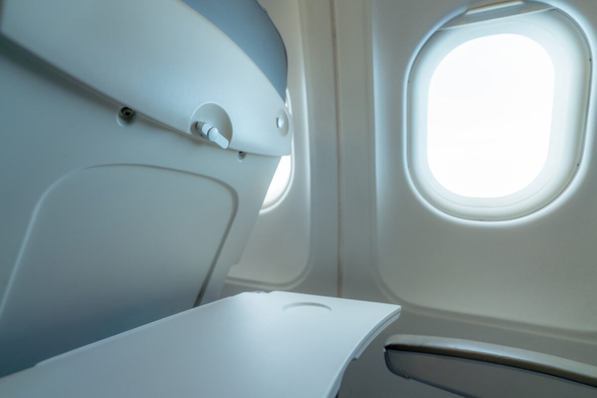 1. Tray tables shutterstock 1846239040 | The Dirtiest and Cleanest Parts of an Airplane: What Travelers Should Know