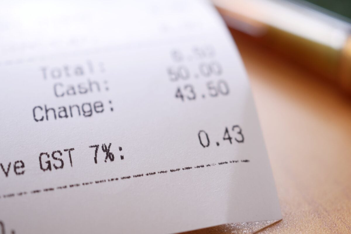 pexels 14647295 | Two Scots Abroad Detailed close-up image of a shopping receipt showing GST and total changes.
