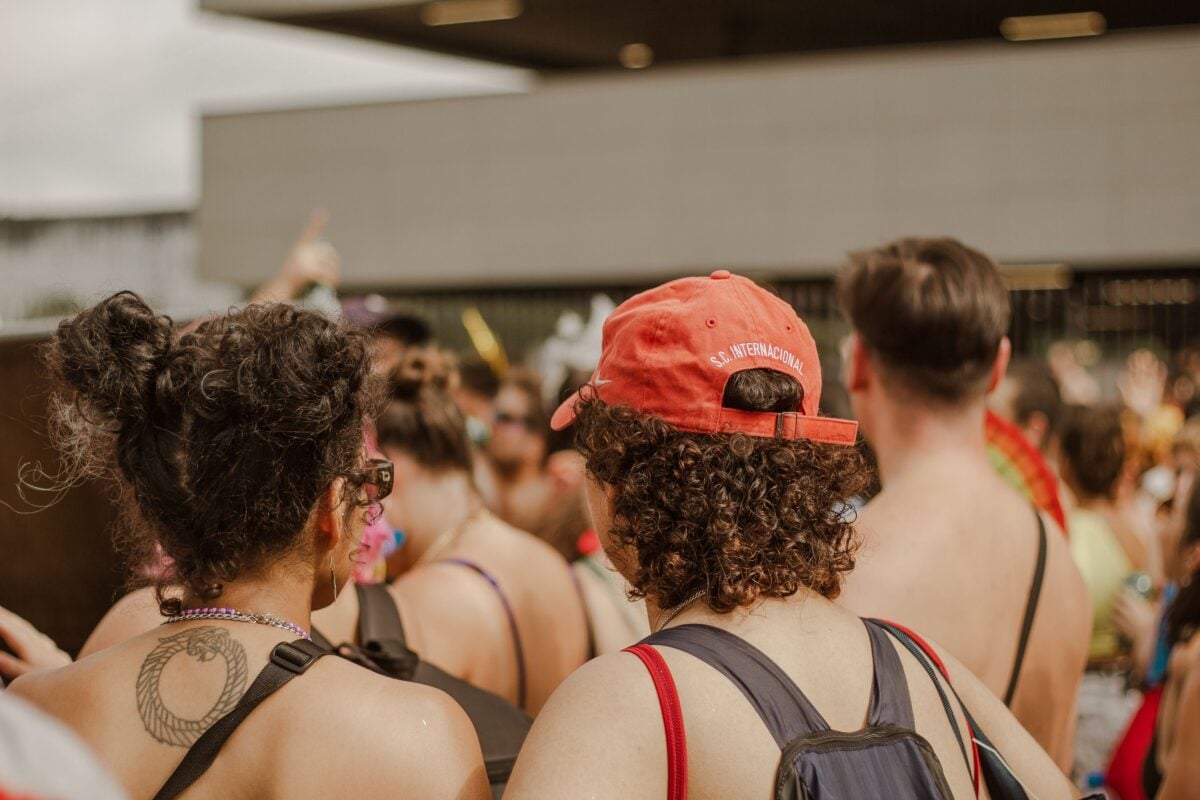 pexels 15451298 | Two Scots Abroad Back view of a vibrant crowd at a summer festival, rich in diversity and energy.