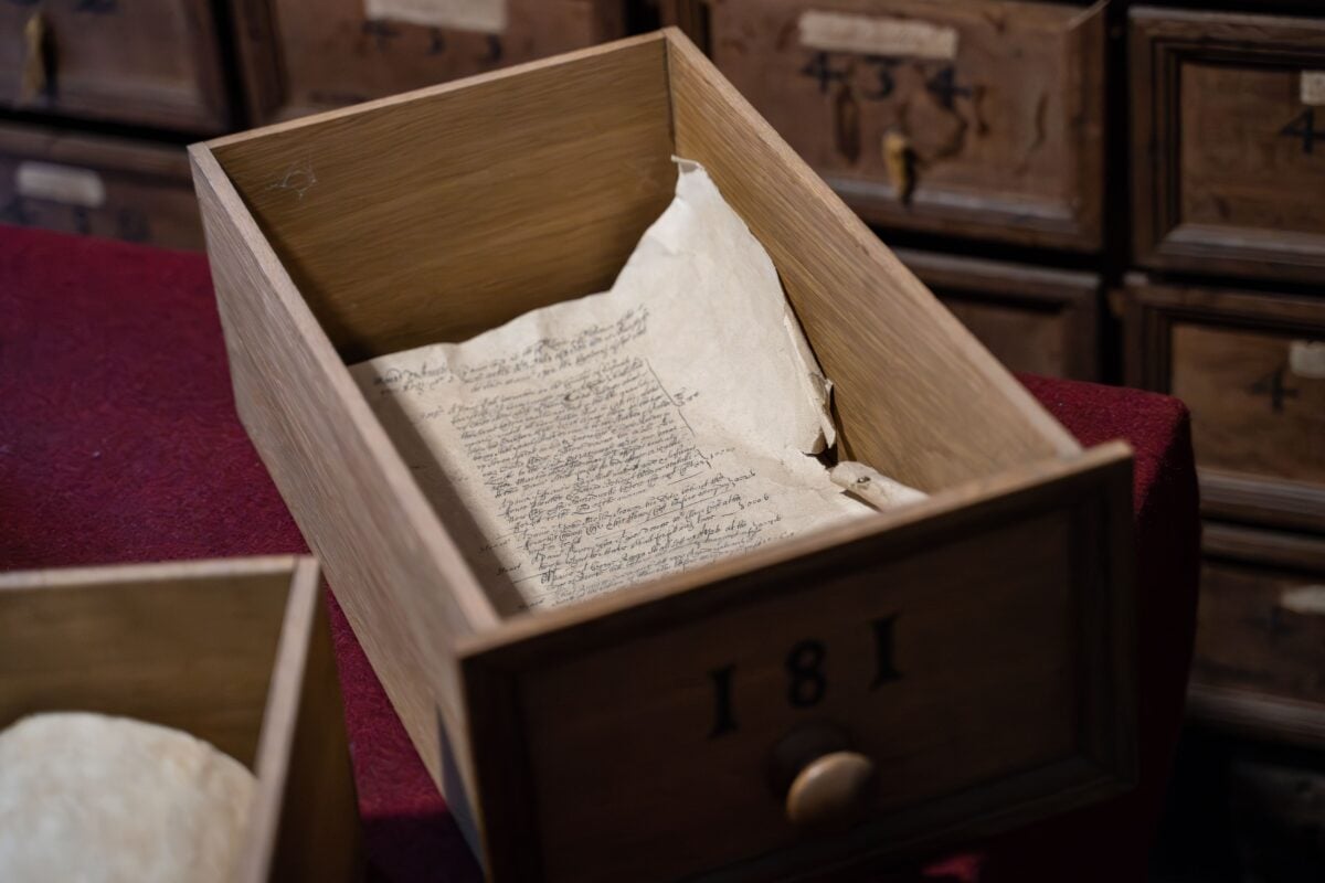pexels 16514852 | Two Scots Abroad Discover an antique manuscript within a vintage wooden drawer, evoking historical charm.