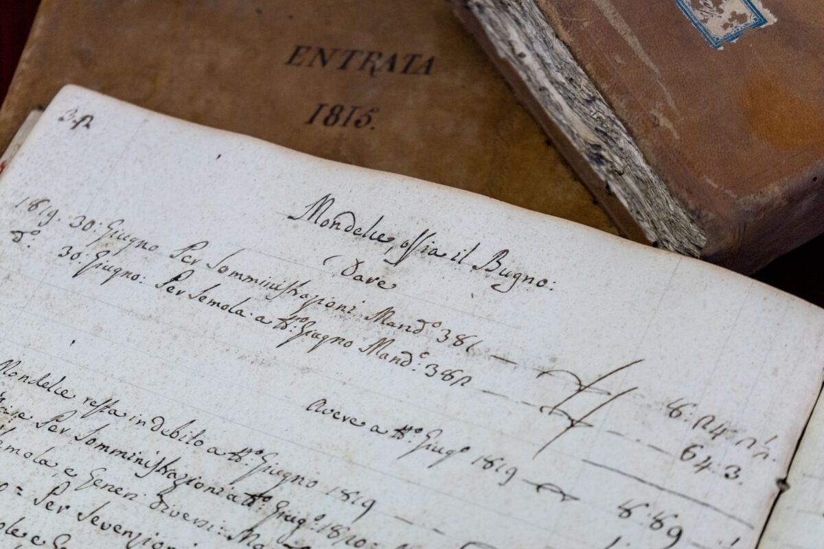 pexels 2355408 | Two Scots Abroad Detailed close-up of 19th-century handwritten documents and antique books.