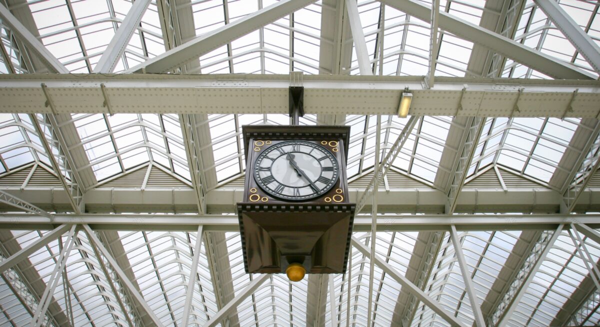 pexels 29415966 | Two Scots Abroad Ornate clock at Glasgow Central Station, highlighting its architectural details and industrial design.