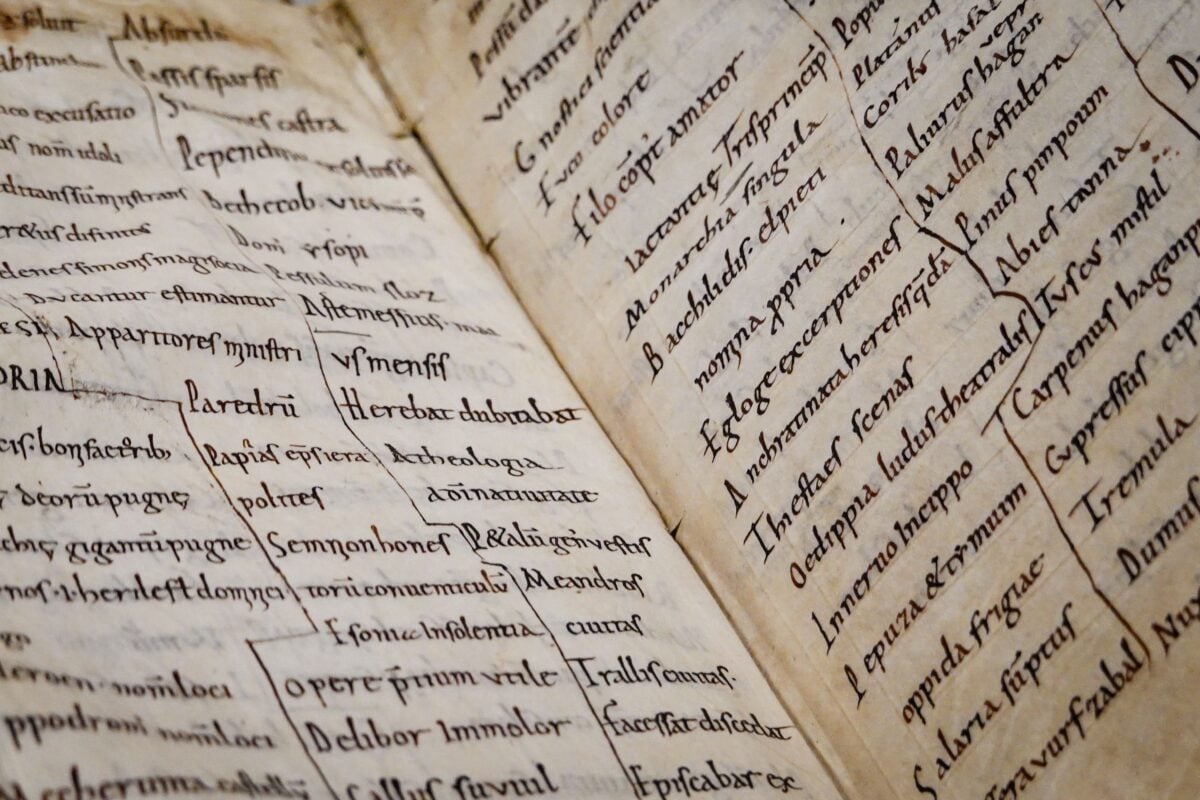 pexels 30019470 | Two Scots Abroad Detailed close-up of an ancient manuscript showcasing Latin text and calligraphy.