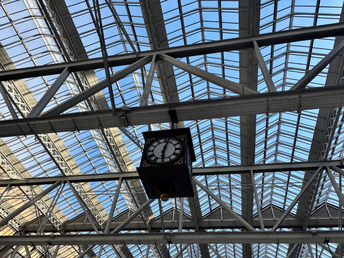 pexels 31716018 | Two Scots Abroad View of the iconic clock and glass roof at Glasgow Central Station, Scotland.
