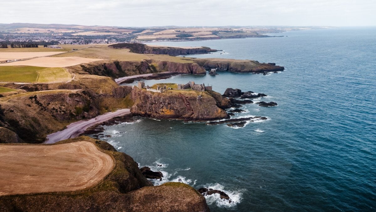 pexels 34130700 | Two Scots Abroad Stunning aerial photo of Dunnottar Castle perched on cliffs along the Scottish coastline.