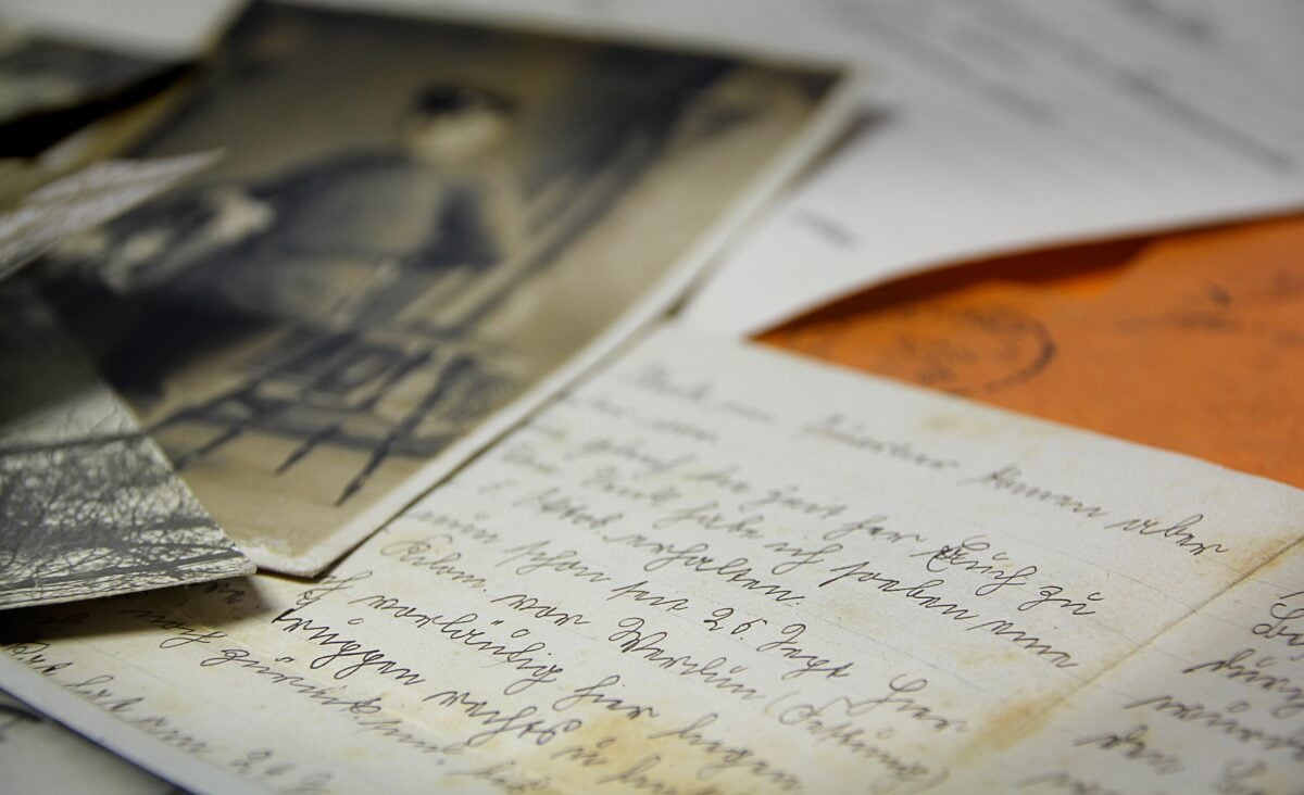 pexels 355713 | Two Scots Abroad Old handwritten letters and vintage photographs spread on a table, creating a nostalgic feel.