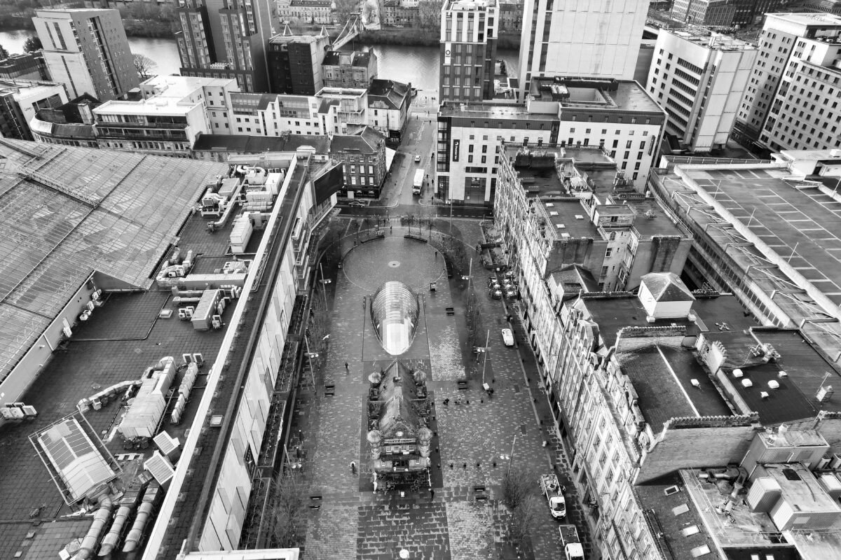 pexels 36472509 | Two Scots Abroad A dramatic aerial black and white view of Glasgow city center, showcasing its architecture and urban design.