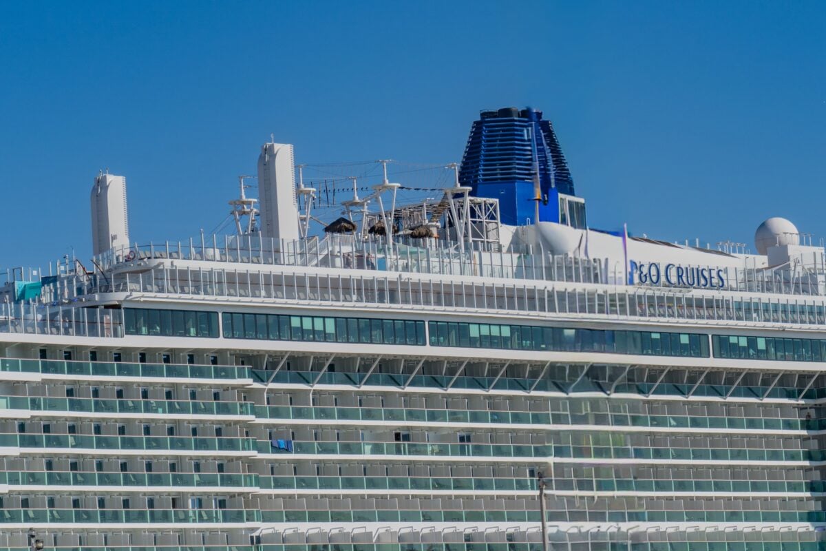 pexels 37284595 | Two Scots Abroad Close-up of a modern cruise ship docked in Cádiz, Spain under a clear blue sky.