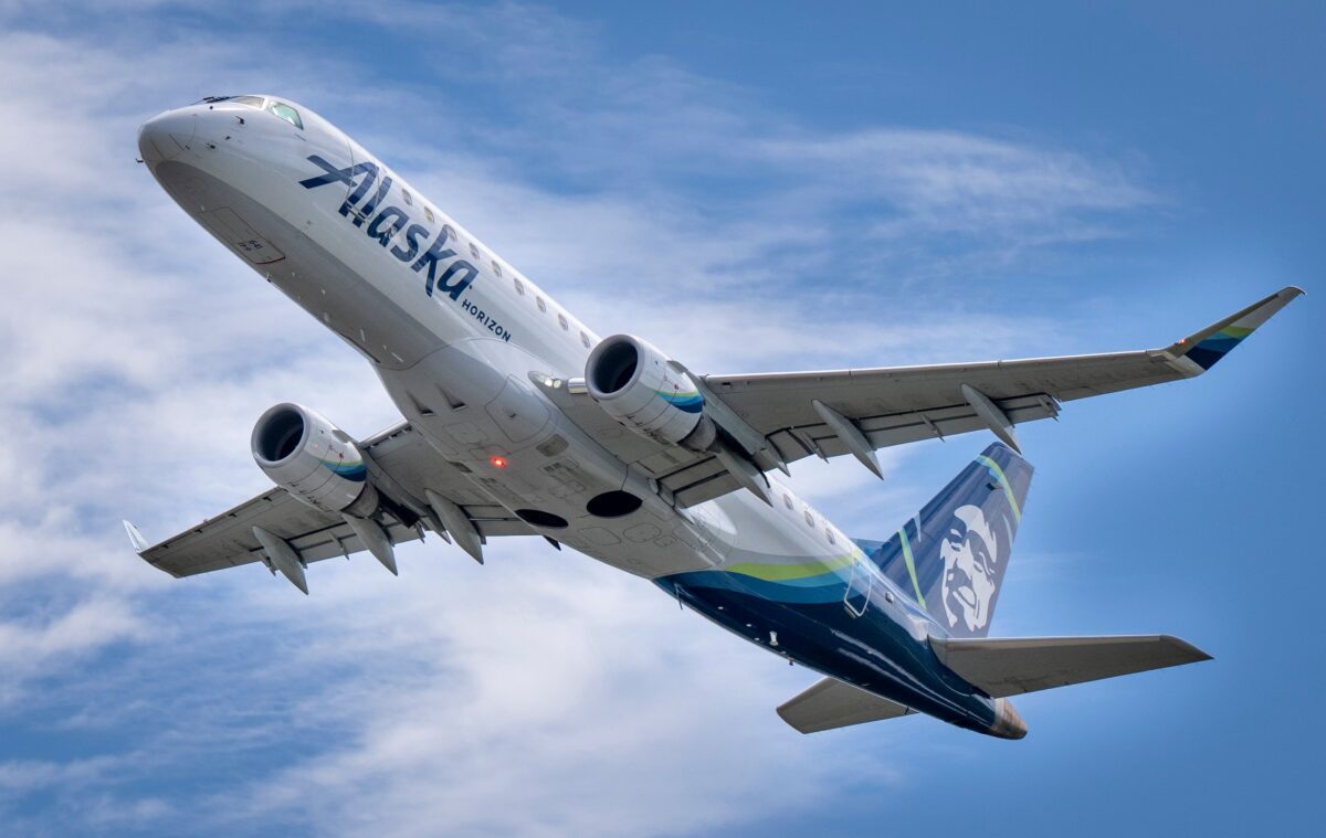 pexels 37538281 | Two Scots Abroad A stunning capture of an Alaska Airlines jet taking off under a clear blue sky in Seattle, Washington.