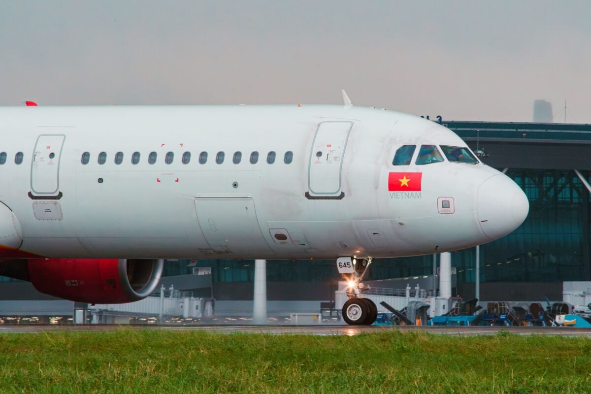 pexels 38679277 | Two Scots Abroad Vietnam Airlines Airbus A320 preparing for takeoff at modern airport.