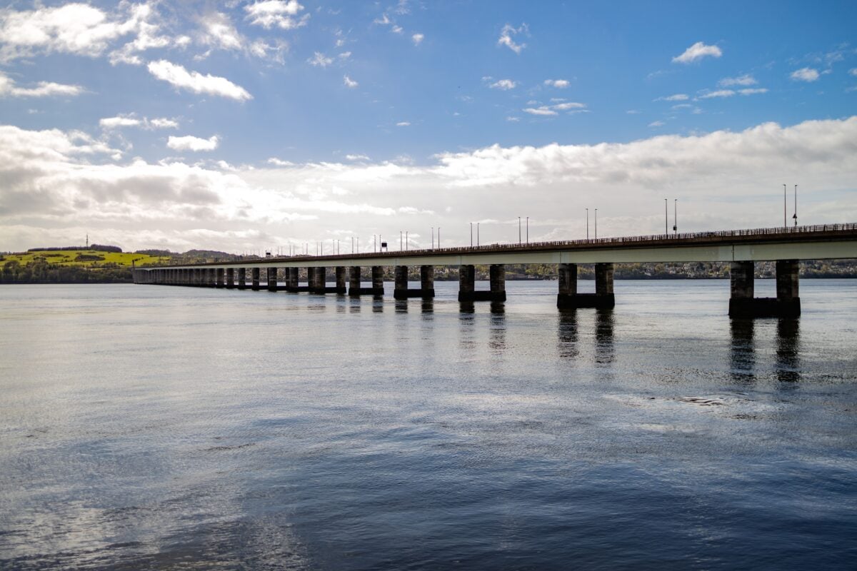 Scenic view of Tay Road Bridge spanning the River Tay in Dundee, Scotland on a sunny day.