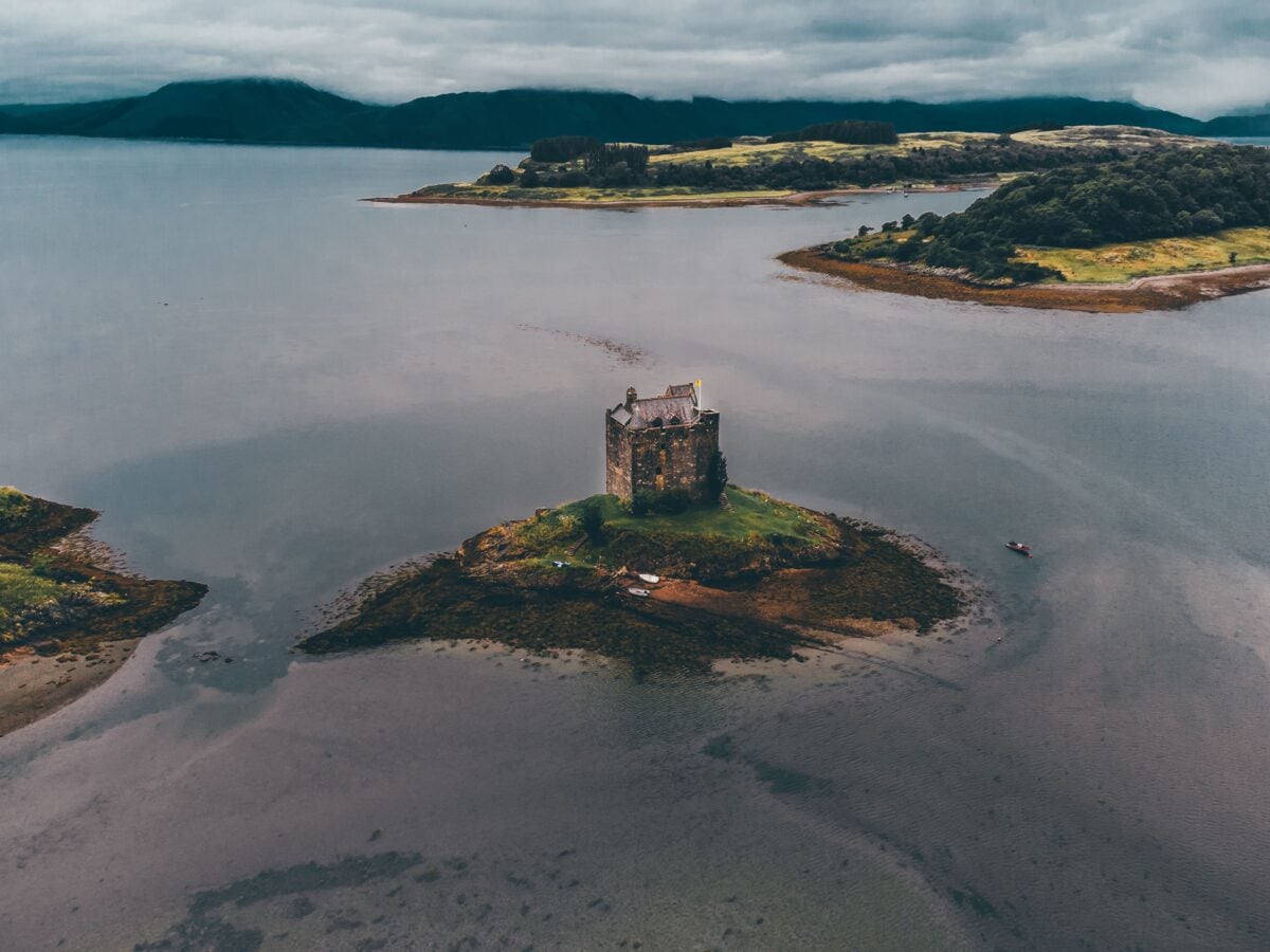pexels 9306222 | Two Scots Abroad Stunning drone view of Castle Stalker on a small islet in Loch Laich, Scotland.