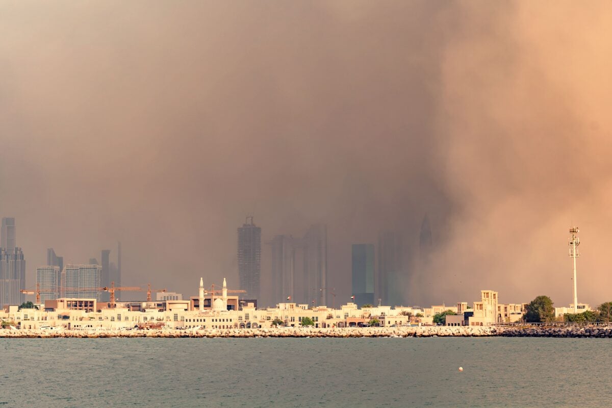 pexels 9679749 | Two Scots Abroad A dense sandstorm envelops Dubai's iconic skyline, creating a striking urban scene.