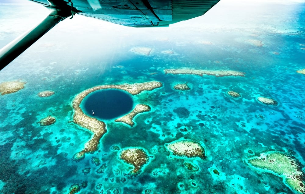 Belizes Great Blue Hole shutterstock 2251108831 | 5 Adventure Bucket List Destinations for Your Next Big Trip