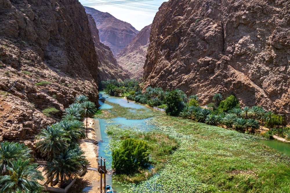 Wadi Shab shutterstock 2441936405 | Oman Without a Rental Car: A Practical 5-Day Itinerary