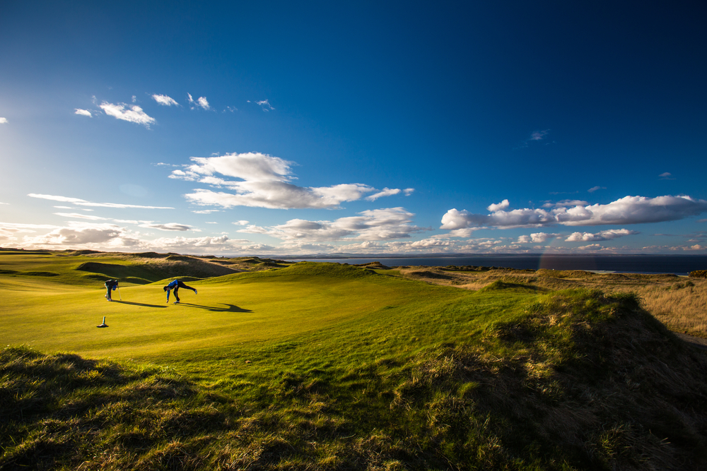 golfing at the course during dusk | Two Scots Abroad golfers at dusk