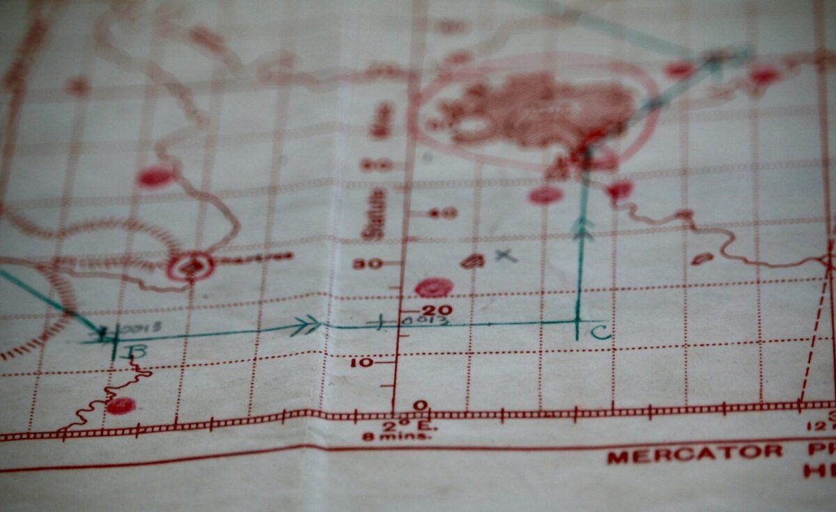 pexels 2678374 | Two Scots Abroad Detailed close-up of a vintage nautical map with visible coordinates and navigation markings.