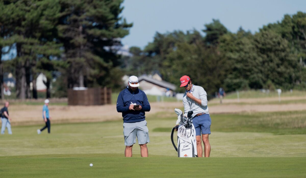 pexels 33245540 | Two Scots Abroad Two male golfers preparing on a sunny day at a Scotland golf course.