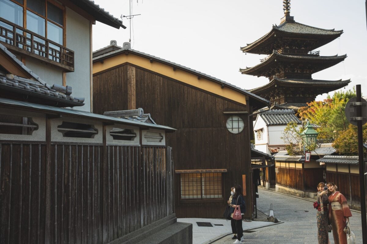 pexels 5745779 | Two Scots Abroad Japanese females in traditional clothes taking selfie on authentic oriental street against Asian pagoda