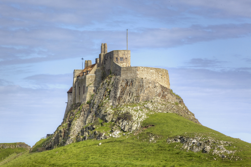 2. Holy Island of Lindisfarne Northumberland shutterstock 105465236 | 8 Beautiful Islands That Reveal a Path From the Mainland at Low Tide in Britain