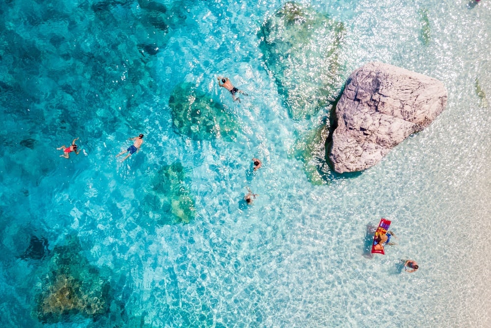 Rethink Swimming and Beach Activities shutterstock 2756686065 | Travelling With a Wound: What to Know Before You Go