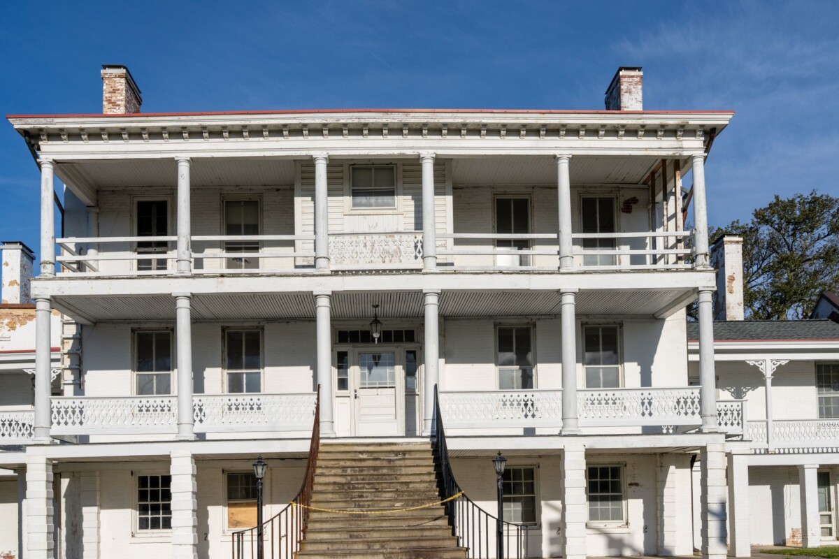 a historic three story white building in hampton virginia under clear blue skies | Two Scots Abroad A historic three-story white building in Hampton, Virginia under clear blue skies.
