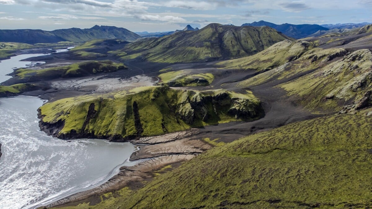 aerial view of green highlands and river in thingeyjarsveit iceland during summe | Two Scots Abroad Aerial view of green highlands and river in Þingeyjarsveit, Iceland during summer.