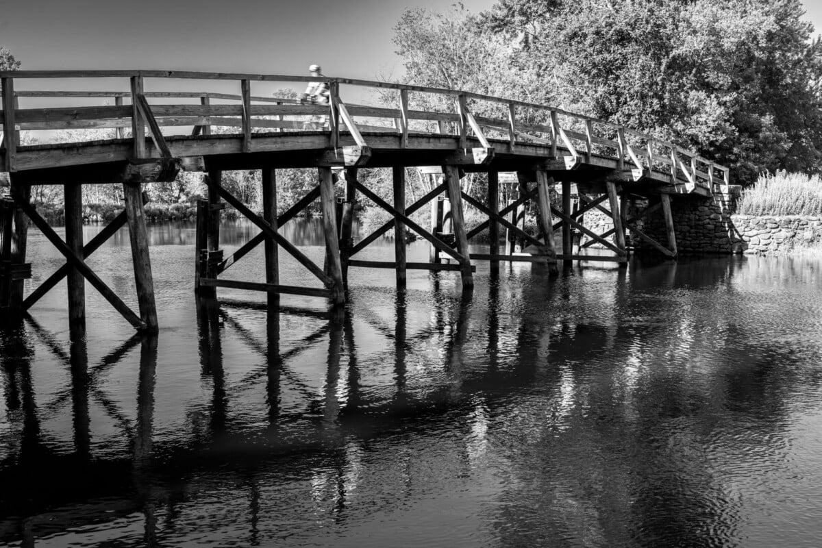 black and white photo of the iconic old north bridge in concord massachusetts | Two Scots Abroad Black and white photo of the iconic Old North Bridge in Concord, Massachusetts.
