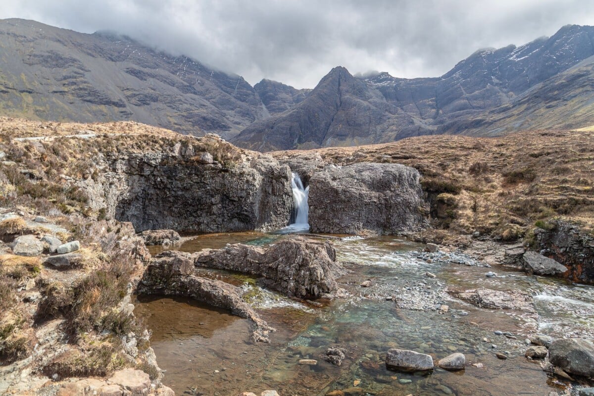 Breathtaking landscape of the Fairy Pools with mountains in Scotland.