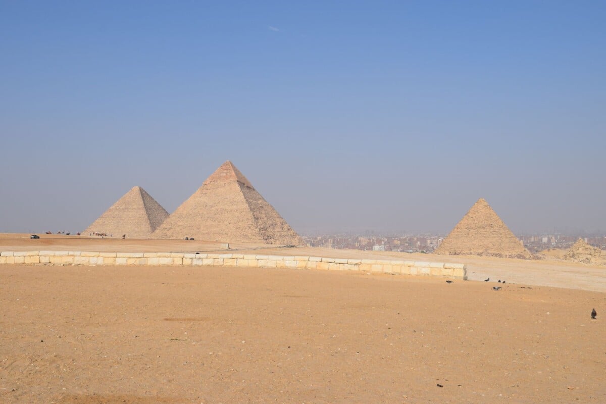 breathtaking landscape of the giza pyramids under a clear blue sky in cairo egyp | Two Scots Abroad Breathtaking landscape of the Giza Pyramids under a clear blue sky in Cairo, Egypt.