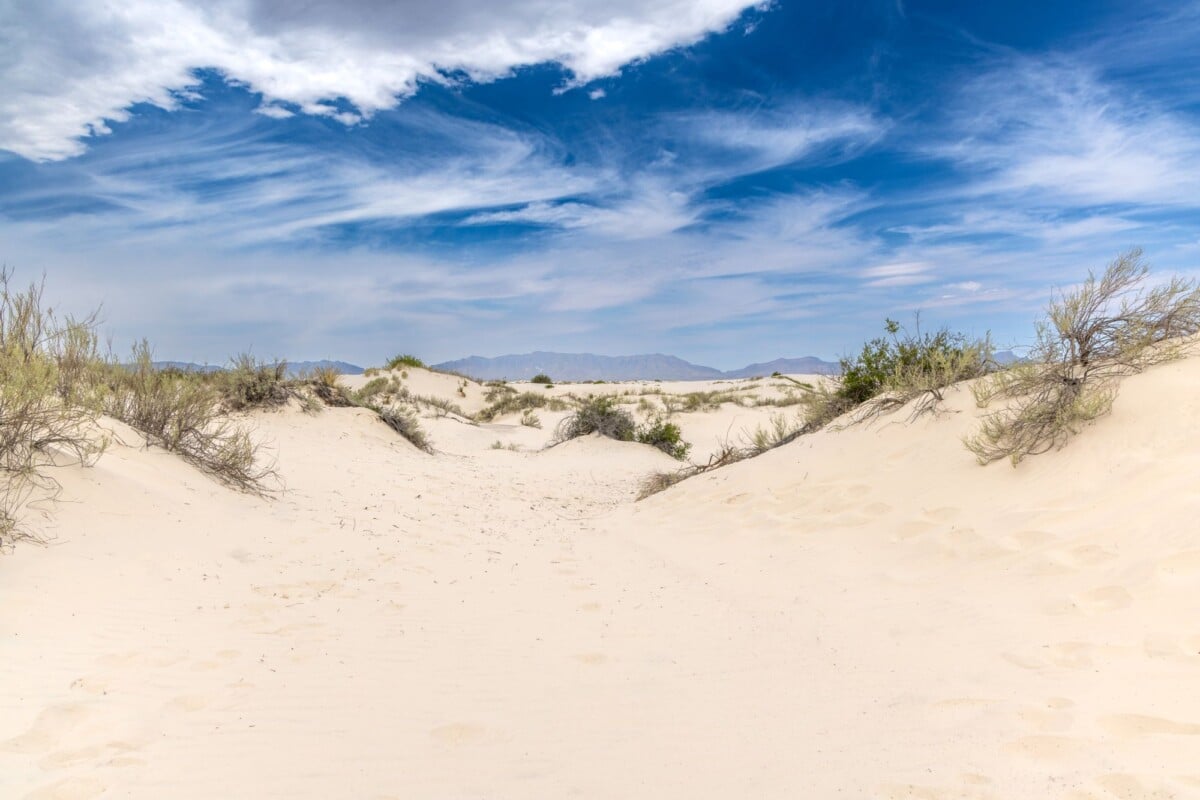 breathtaking view of white sands national park showcasing desert landscapes with | Two Scots Abroad Breathtaking view of White Sands National Park showcasing desert landscapes with blue sky and clouds.