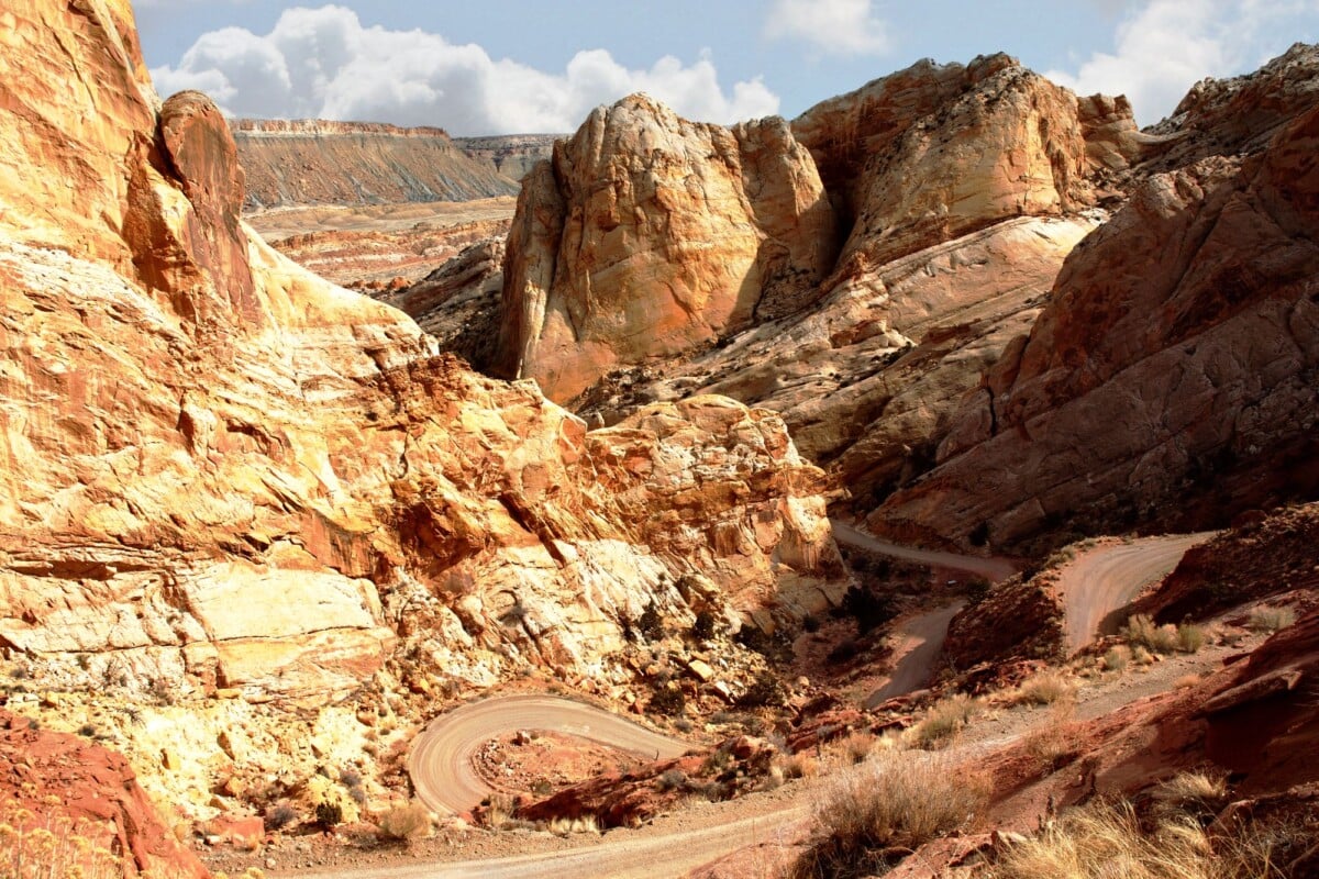 captivating view of burr trail switchbacks amidst rugged desert rock formations | Two Scots Abroad Captivating view of Burr Trail switchbacks amidst rugged desert rock formations in Utah.