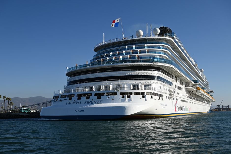 carnival firenze cruise ship docked in port under a clear blue sky | Two Scots Abroad Carnival Firenze cruise ship docked in port under a clear blue sky.