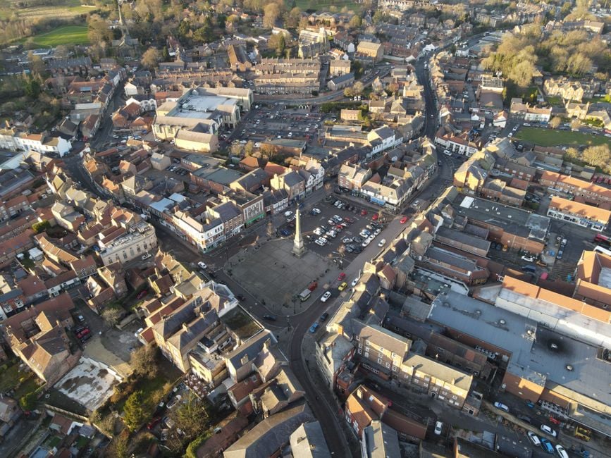 Drone shot of Ripon Market Square, showcasing the charming layout of the historic town in England.