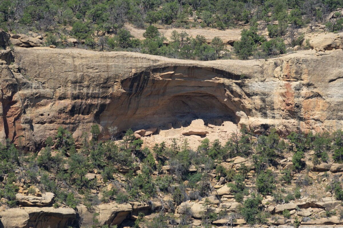 explore the ancient cliff dwellings nestled in mesa verdes sandstone cliffs rich | Two Scots Abroad Explore the ancient cliff dwellings nestled in Mesa Verde's sandstone cliffs, rich with natural beauty.