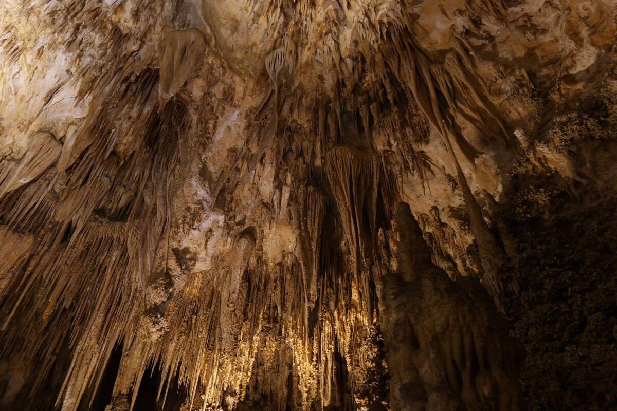 explore the mesmerizing stalactites within carlsbad caverns national parks iconi | Two Scots Abroad Explore the mesmerizing stalactites within Carlsbad Caverns National Park's iconic caves.