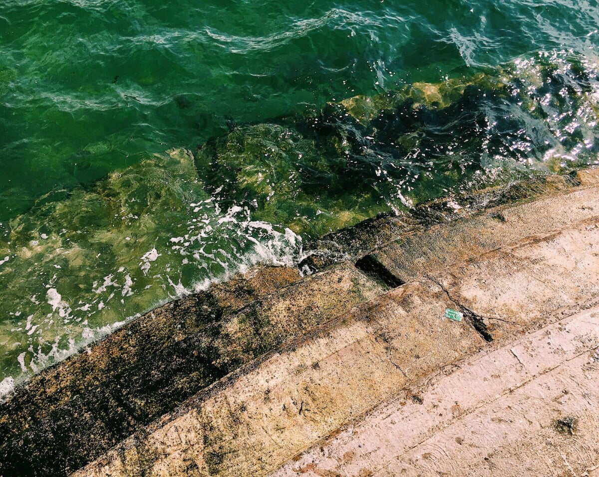 from above of shabby stone stairs near foamy rippled sea with clear turquoise wa | Two Scots Abroad From above of shabby stone stairs near foamy rippled sea with clear turquoise water in sunny summer day