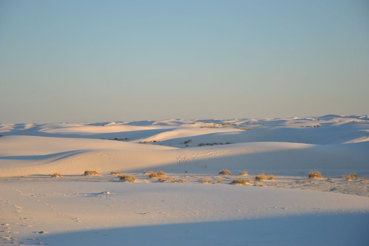 golden hour over the white sand dunes in new mexicos white sands national park | Two Scots Abroad Golden hour over the white sand dunes in New Mexico's White Sands National Park.
