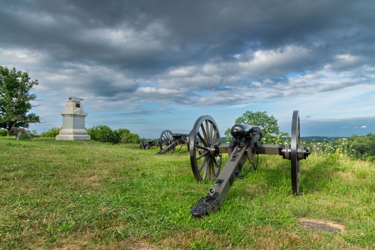 historic cannons and memorial at gettysburg pennsylvania set against a dramatic | Two Scots Abroad Historic cannons and memorial at Gettysburg, Pennsylvania, set against a dramatic sky.