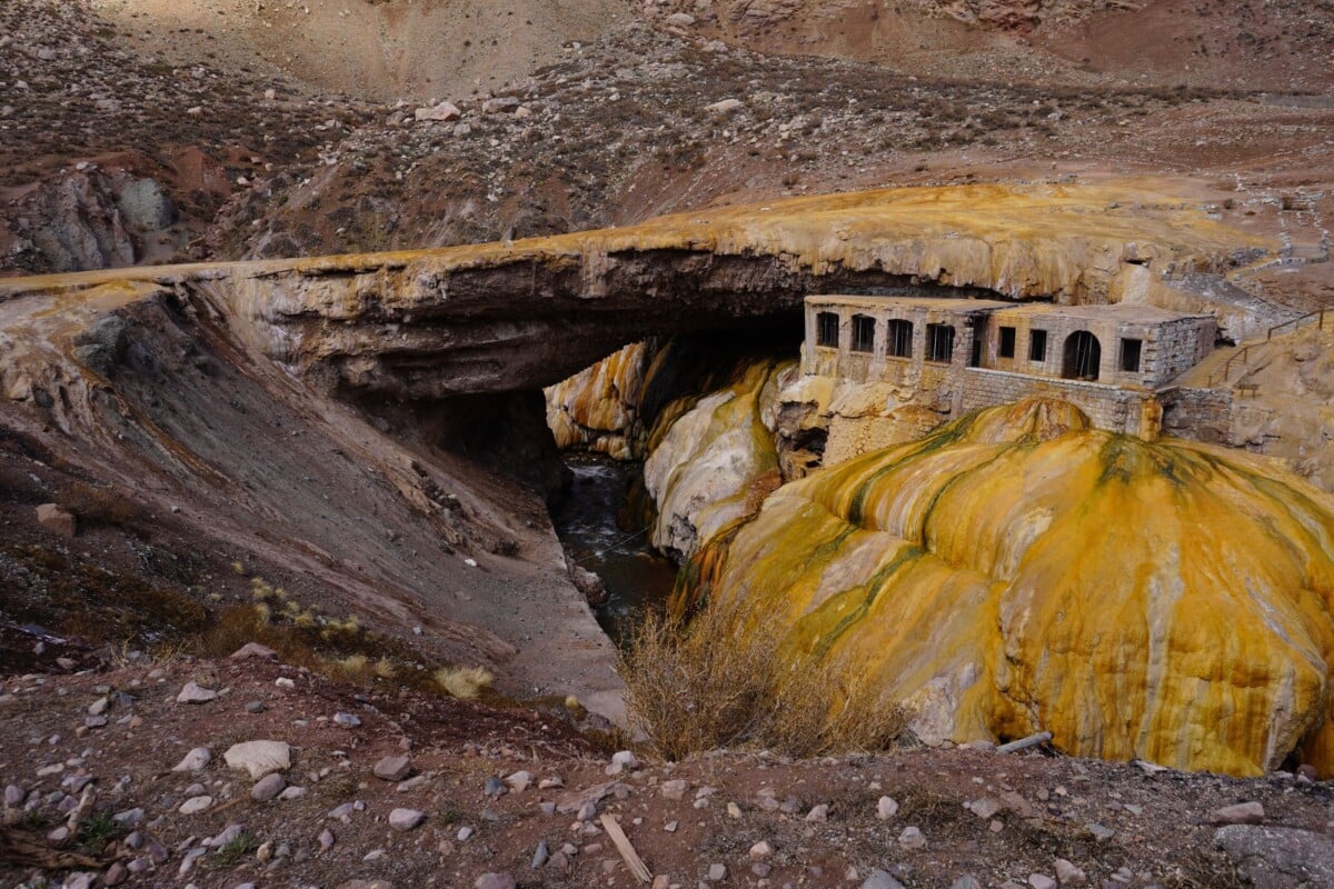 historic puente del inca natural bridge and ruins in mendoza argentina with stri | Two Scots Abroad Historic Puente del Inca natural bridge and ruins in Mendoza, Argentina, with striking mineral deposits.
