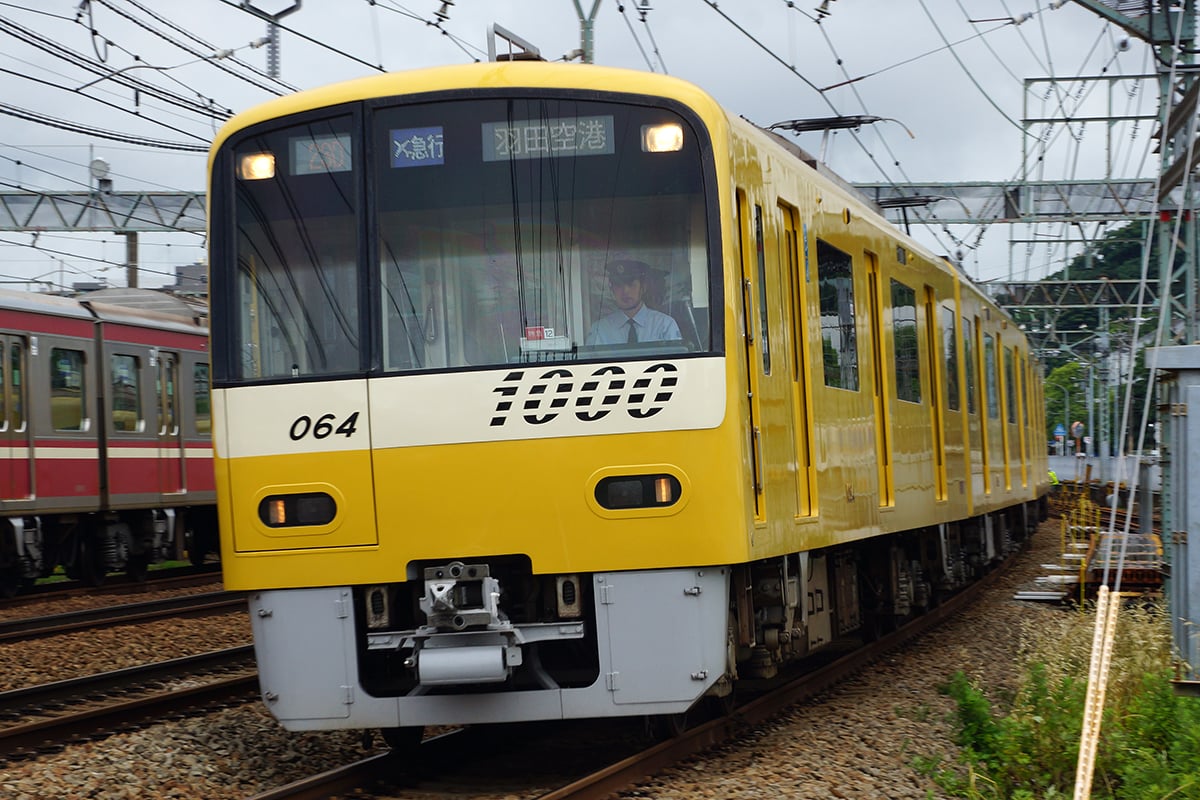 keikyu n1000 series emu set 1057 in special yellow happy train livery on the kei | Two Scots Abroad Keikyu N1000 series EMU set 1057 in special "Yellow Happy Train" livery on the Keikyu Main Line between Kanazawa-Hakkei and Kanazawa-Bunko stations on an up airport express service to Haneda Airport.