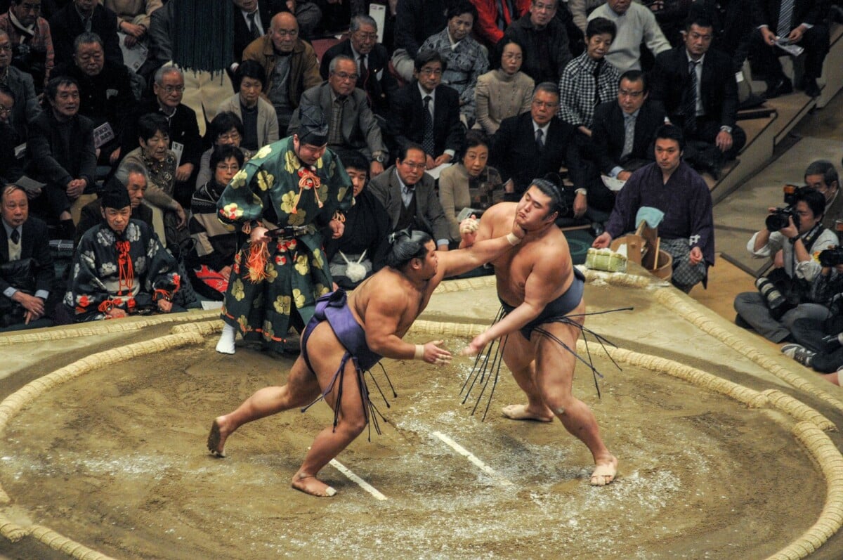 sumo wrestlers compete in a traditional match with an enthusiastic audience in j | Two Scots Abroad Sumo wrestlers compete in a traditional match with an enthusiastic audience in Japan.