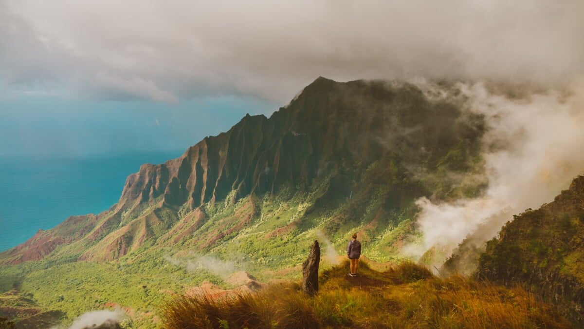 a mesmerizing scene at kalalau lookout hawaii with a view of cliffs and ocean | Two Scots Abroad A mesmerizing scene at Kalalau Lookout, Hawaii, with a view of cliffs and ocean.
