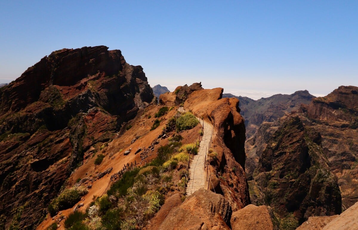 breathtaking view of hiking trail along pico do arieiro in madeiras rugged mount | Two Scots Abroad Breathtaking view of hiking trail along Pico do Arieiro in Madeira's rugged mountains.