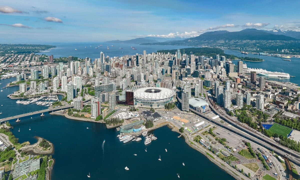 Skyline of Vancouver, Canada: Aerial view of downtown Vancouver, British Columbia, Canada. It is the 3rd largest metropolitan area in Canada and has the 4th highest population density in North America