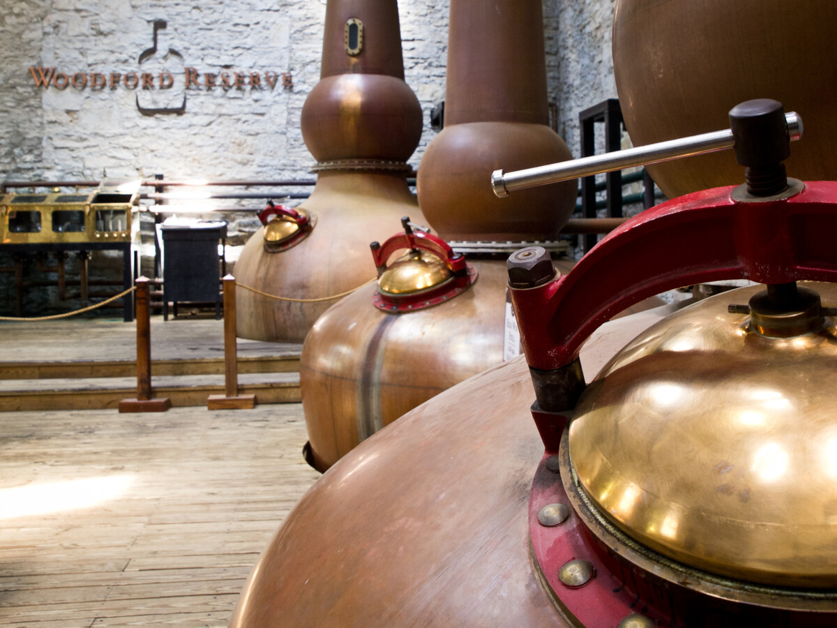 woodford reserve distillery 27527 2 the still room where copper stills are used | Two Scots Abroad Woodford Reserve Distillery-27527-2: The Still Room, where copper stills are used to separate alcohol from the mash, in a process known as distillation . Photo taken with an Olympus E-5 at the Woodfor